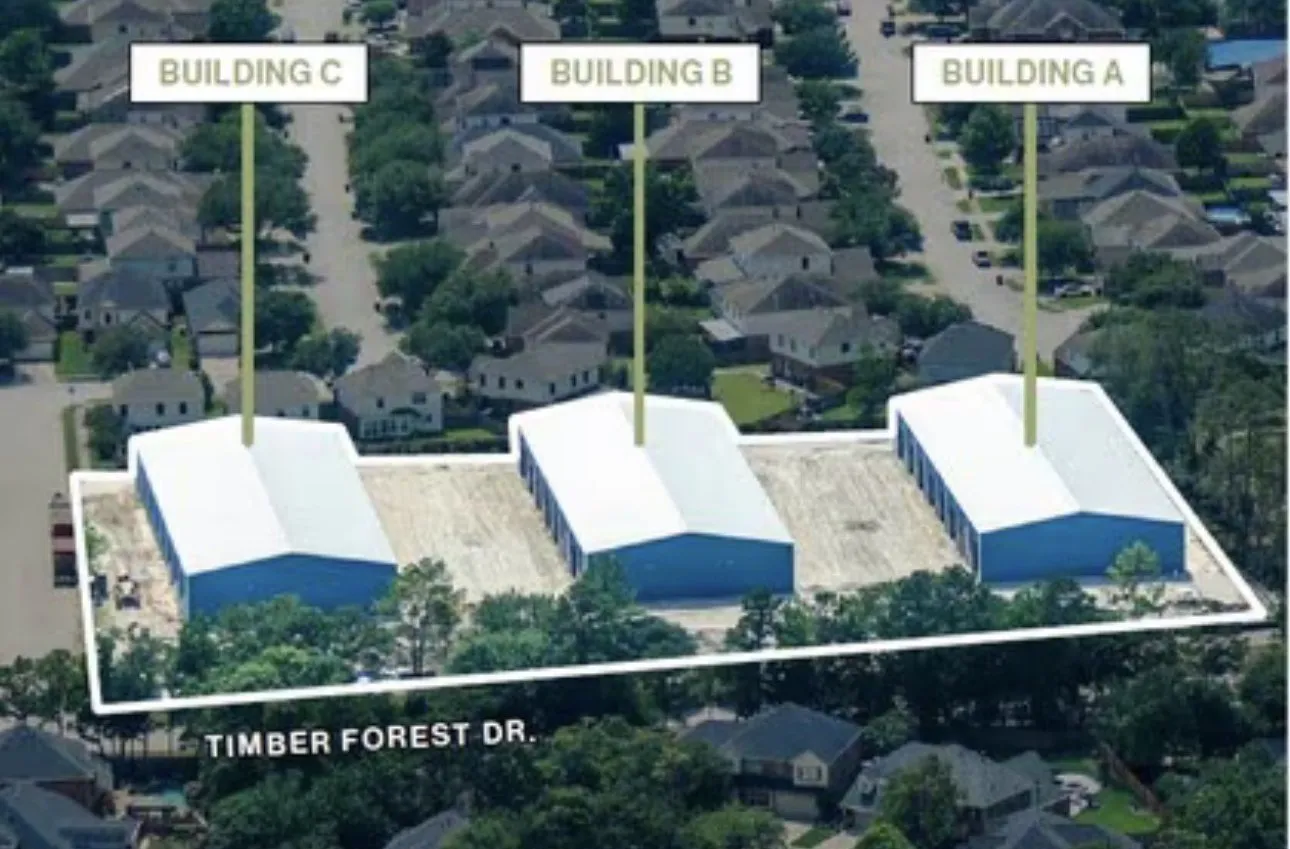 Aerial view of the property with Buildings A, B and C labelled and Timber Forest Drive marked along the front boundary.